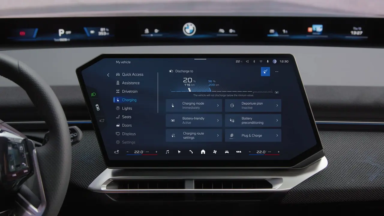 BMW infotainment screen showing the discharging adapter menu and 20 percent battery reserve