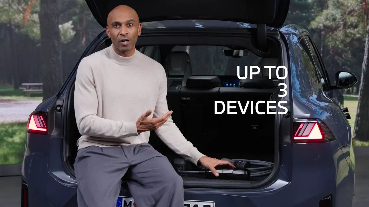 BMW says the multifunction charger and discharging adapter can power up to three devices at once