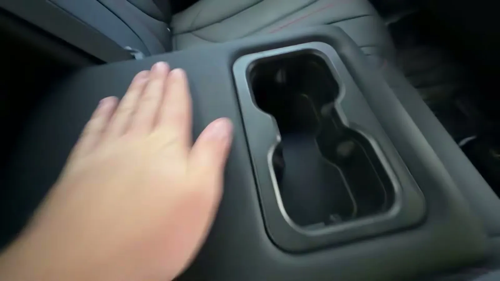 Close-up of the BYD Shark 6 interior storage and console
