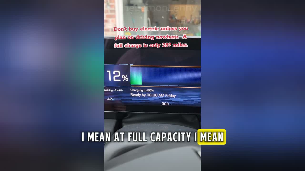 GMC Hummer EV displaying long charge time estimate on wall outlet
