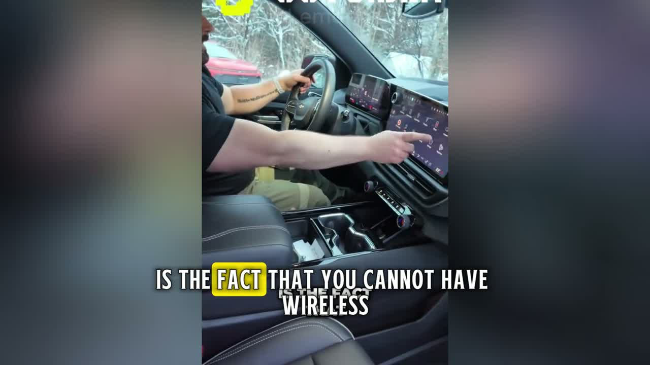 Happy electric truck owner charging at home in garage