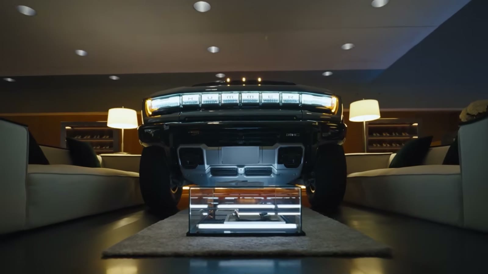 Rivian R1T parked off-road demonstrating its ground clearance and gear tunnel access