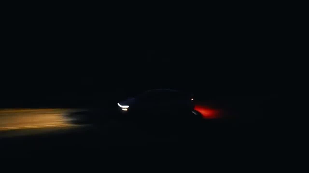 2026 Tesla Model Y Performance front three-quarter with LED light bar