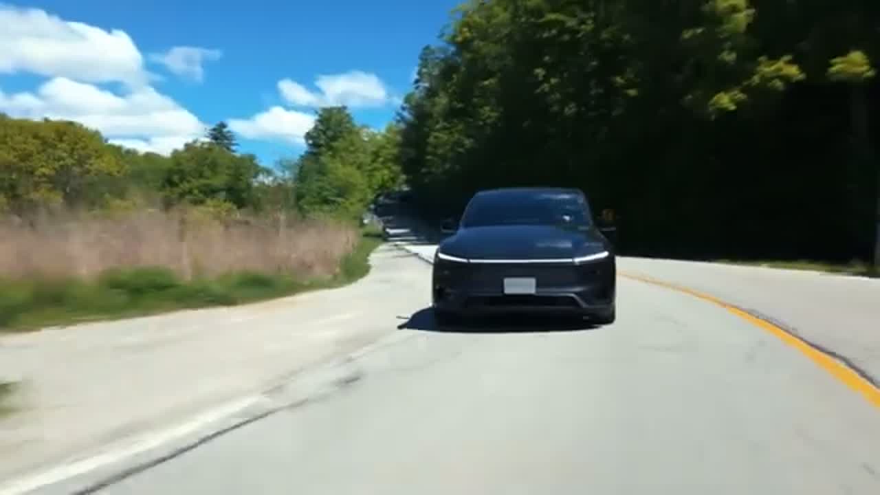 2026 Model Y Performance rear with carbon fiber spoiler and LED bar
