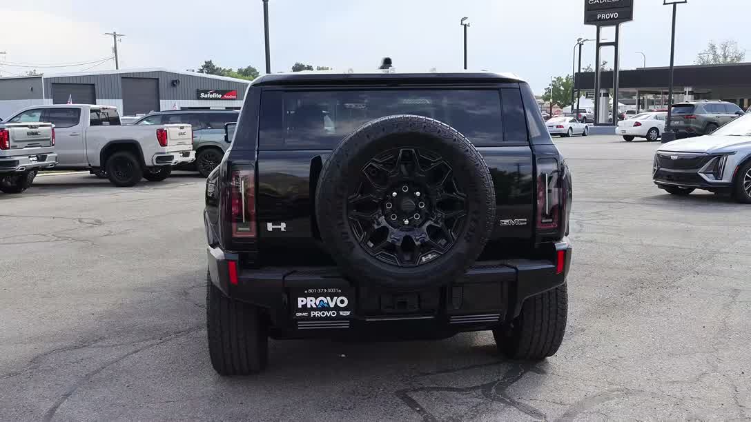 Hummer EV interior with the large central touchscreen and digital cluster