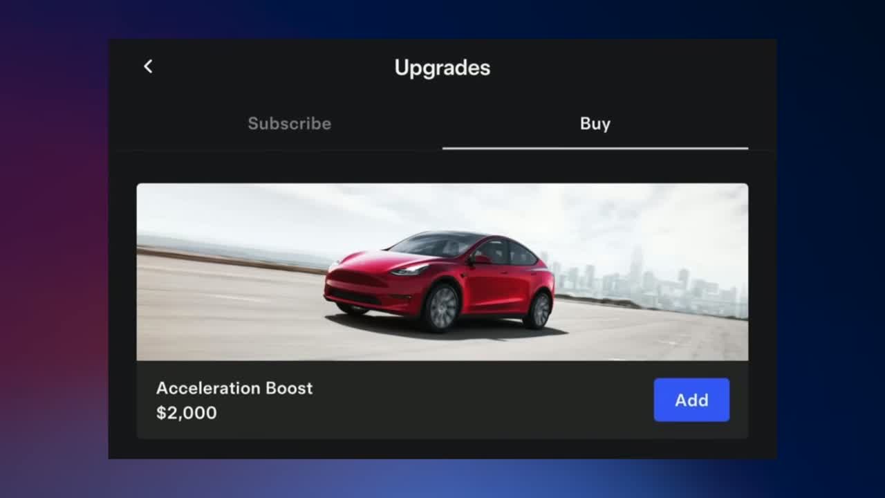 Tesla app upgrades screen showing FSD and connectivity subscriptions