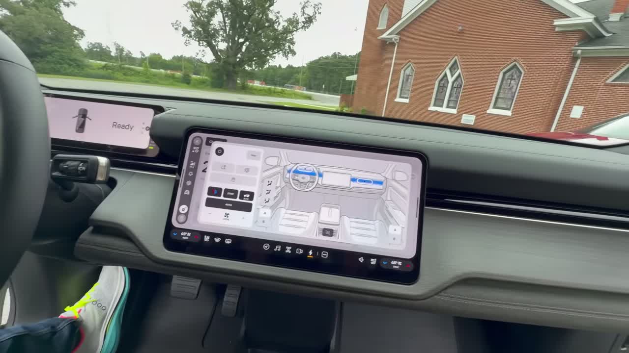 Side-by-side shot of the R2 and Model Y on the highway