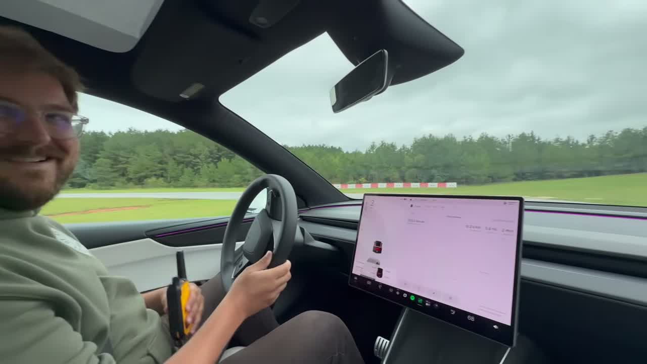 Rivian R2 charging at a public DC fast charger