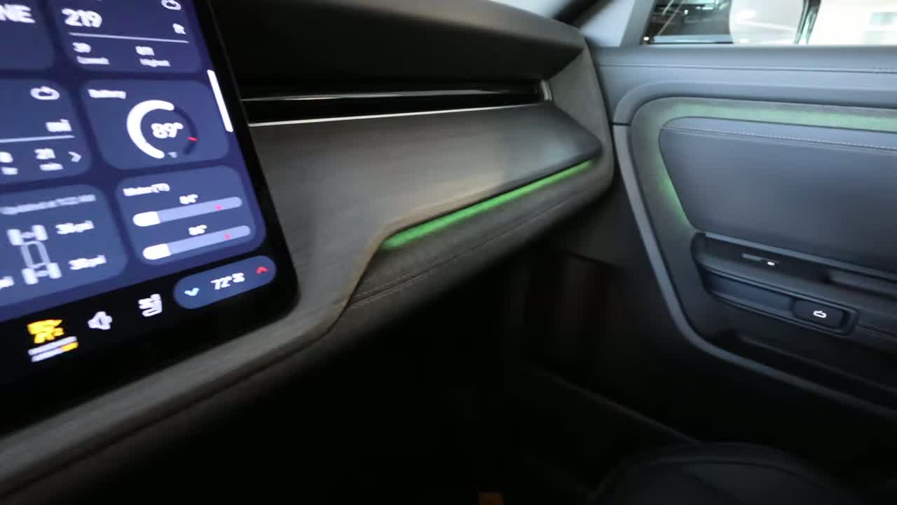 Rivian R2 rear cargo area with cover and spare tire
