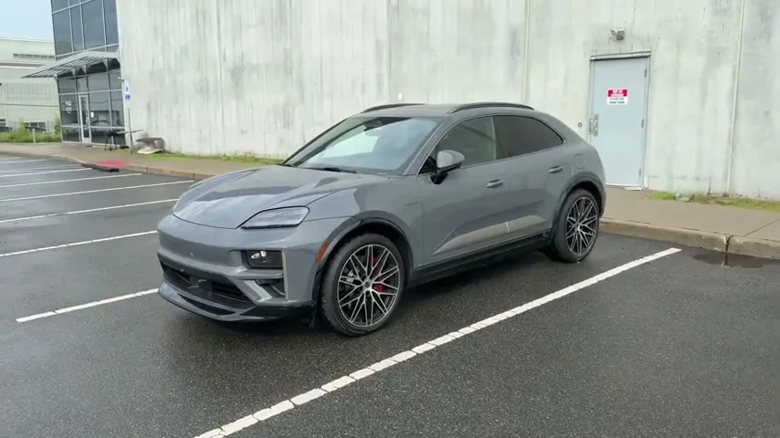 Porsche Macan Turbo EV instrument cluster and steering wheel