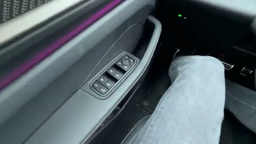 Porsche Macan Turbo EV charging port and cable