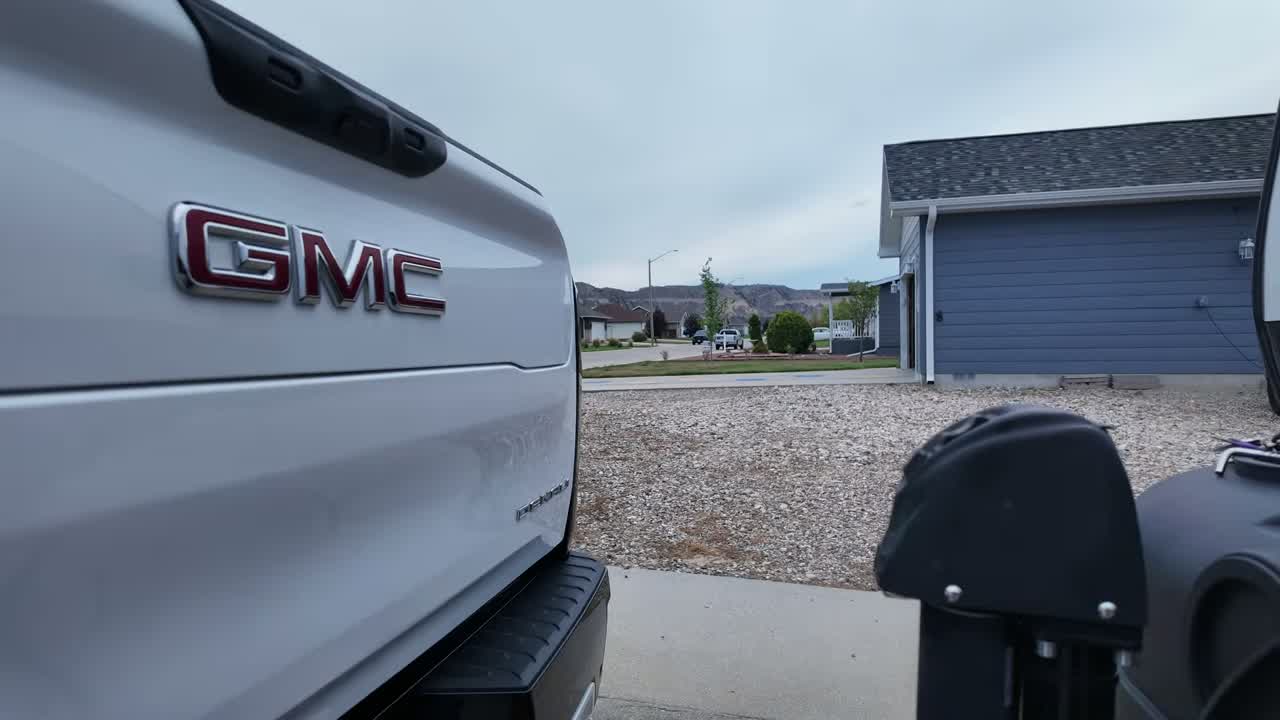 Sierra EV Denali energy screen showing towing efficiency in miles per kWh