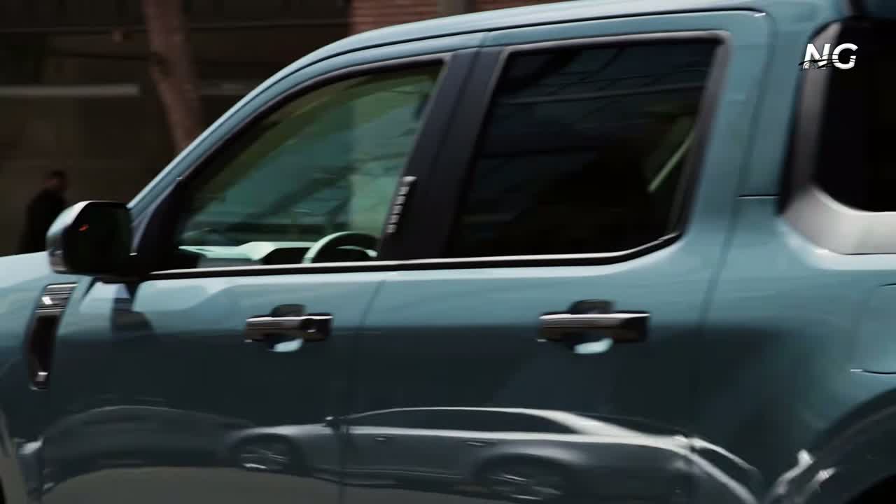 Slate two-seat cab interior with phone mount and physical controls