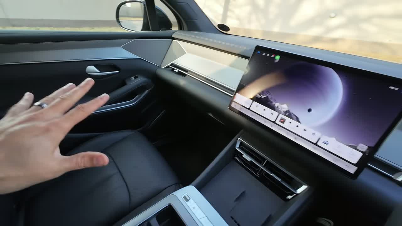 BYD ATTO 8 interior with large central touchscreen and minimalist dashboard