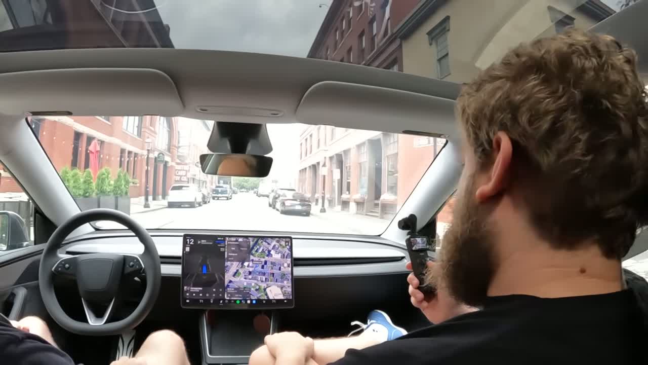 FSD 14.3.6 navigating a complex city intersection with the visualization on the Model Y screen