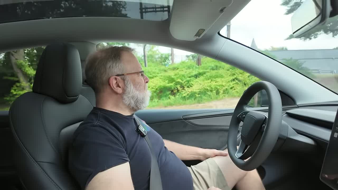 Tesla dashboard view during the FSD 14.3.6 supervised drive in Lowell, Massachusetts