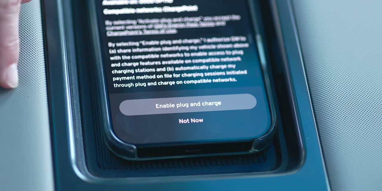GM vehicle touchscreen showing the 'Enable plug and charge' consent dialog.