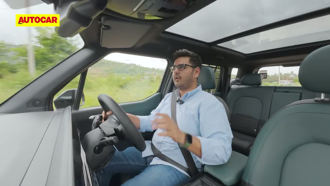 Kia Syros EV driving on an Indian road