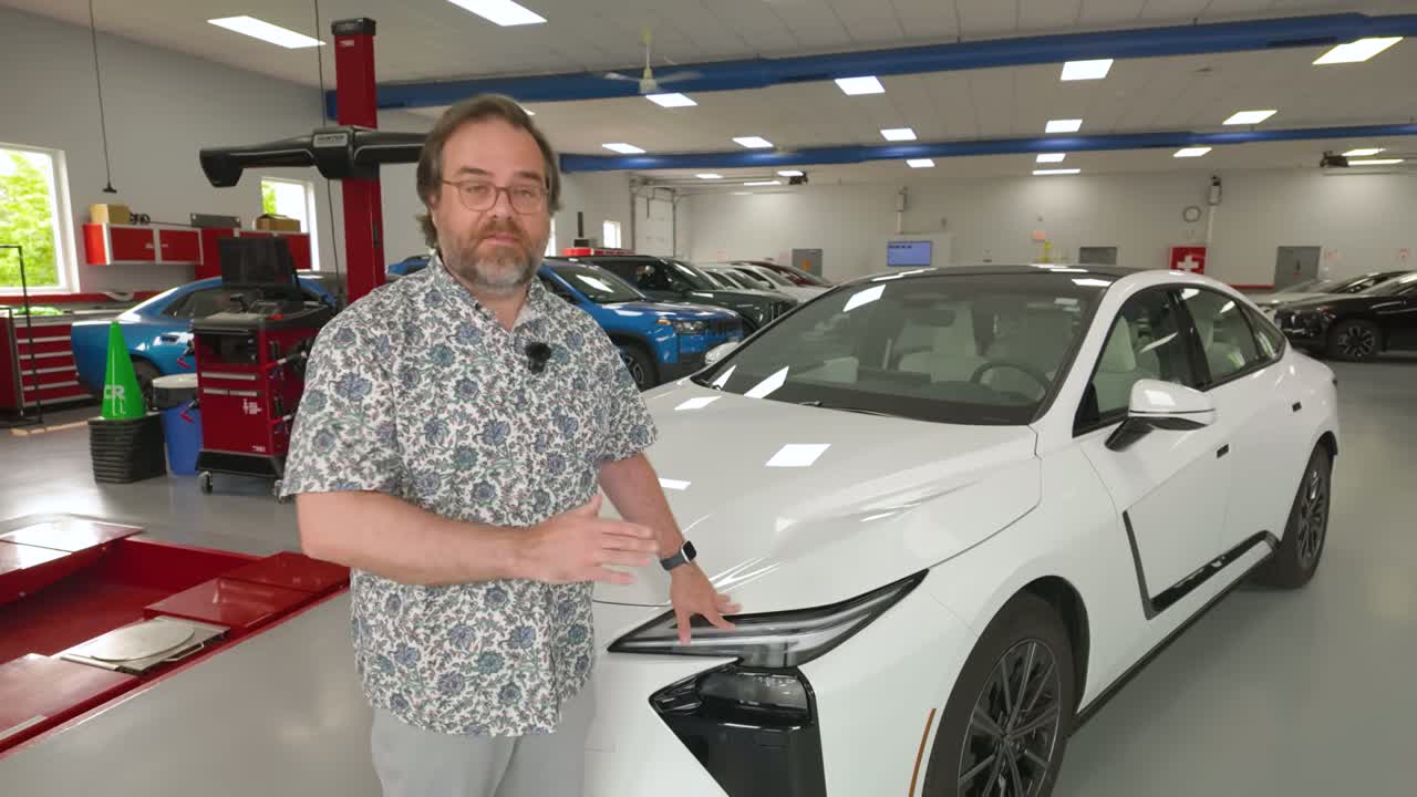 2026 Lexus ES 500e AWD electric sedan front three-quarter view